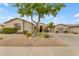 Charming single-story home featuring a well-manicured desert landscape and a spacious three-car garage at 6870 S Justin Way, Chandler, AZ 85249
