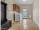 Spacious laundry room featuring travertine floors, washer and dryer, and utility sink at 6870 S Justin Way, Chandler, AZ 85249