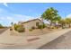 Corner lot home in Arizona with low maintenance desert landscaping including gravel and bushes at 6870 S Justin Way, Chandler, AZ 85249