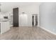 Open-concept living area with modern kitchen and view of interior hallway at 7425 W Corrine Dr, Peoria, AZ 85381
