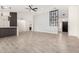 Spacious living room showcasing modern design elements and tiled flooring at 7425 W Corrine Dr, Peoria, AZ 85381