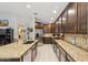Spacious kitchen featuring granite countertops, stainless steel appliances, and ample cabinetry at 7457 W Crystal Rd, Glendale, AZ 85308