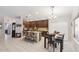 Well-lit kitchen with granite countertops, breakfast bar, and modern stainless steel appliances at 7457 W Crystal Rd, Glendale, AZ 85308