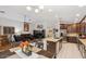Bright, open kitchen with stainless steel appliances, granite countertops, and tiled backsplash at 7457 W Crystal Rd, Glendale, AZ 85308