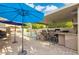 Fantastic outdoor kitchen and bar area with seating, great for entertaining near the pool at 7457 W Crystal Rd, Glendale, AZ 85308