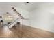 Open living area with staircase, offering a spacious and airy atmosphere at 7665 E Montecito Ave, Scottsdale, AZ 85251