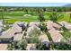 Stunning aerial view of the tile rooftops and golf course in this luxury community at 7705 E Doubletree Ranch Rd # 8, Scottsdale, AZ 85258