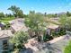 Gorgeous aerial view of well maintained home with tile roof and lush landscaping at 7705 E Doubletree Ranch Rd # 8, Scottsdale, AZ 85258