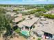Aerial view of beautiful home with a pool, patio, and lush landscaping at 7705 E Doubletree Ranch Rd # 8, Scottsdale, AZ 85258