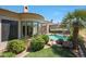 Lush backyard with a pool, hot tub, turf grass, and views of the golf course at 7705 E Doubletree Ranch Rd # 8, Scottsdale, AZ 85258