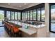 Community Bar/Kitchen area with bar-style seating and expansive windows, perfect for entertaining at 7705 E Doubletree Ranch Rd # 8, Scottsdale, AZ 85258