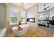 Modern bathroom boasts a standalone tub next to a fireplace and views of the main bedroom at 7705 E Doubletree Ranch Rd # 8, Scottsdale, AZ 85258