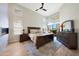 Bright, spacious main bedroom featuring modern decor, fireplace and large windows with a view at 7705 E Doubletree Ranch Rd # 8, Scottsdale, AZ 85258