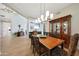 Spacious dining room featuring light wood floors and bright decorative lighting at 7705 E Doubletree Ranch Rd # 8, Scottsdale, AZ 85258
