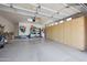 Spacious garage with ample storage, featuring built-in cabinets and organized shelving at 7705 E Doubletree Ranch Rd # 8, Scottsdale, AZ 85258