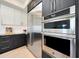 Well-equipped kitchen showcasing stainless steel appliances, including double ovens at 7705 E Doubletree Ranch Rd # 8, Scottsdale, AZ 85258
