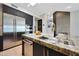 Bright kitchen featuring a large island, stainless steel refrigerator, and modern fixtures at 7705 E Doubletree Ranch Rd # 8, Scottsdale, AZ 85258