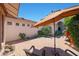 Inviting outdoor patio area, with comfortable seating under a large sun umbrella at 7705 E Doubletree Ranch Rd # 8, Scottsdale, AZ 85258