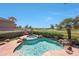 Sparkling backyard pool and hot tub overlook the lush green golf course at 7705 E Doubletree Ranch Rd # 8, Scottsdale, AZ 85258