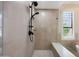 Spacious walk-in shower features stylish tiling and bench seating for a luxurious experience at 7705 E Doubletree Ranch Rd # 8, Scottsdale, AZ 85258