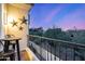 Relaxing private balcony featuring mountain views, metal star accents, and a charming bistro set at 7838 N 54Th Pl, Paradise Valley, AZ 85253