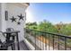 Private balcony featuring mountain views, metal star accents, and a charming bistro set at 7838 N 54Th Pl, Paradise Valley, AZ 85253