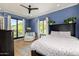 Bright primary bedroom with balcony access, sitting area and beautiful mountain views at 7838 N 54Th Pl, Paradise Valley, AZ 85253