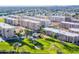 An aerial view of the lush green golf course and multi-Gathering buildings of this community at 7970 E Camelback Rd # 110, Scottsdale, AZ 85251