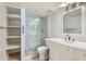 Renovated bathroom featuring a glass enclosed shower and sleek vanity at 7970 E Camelback Rd # 110, Scottsdale, AZ 85251