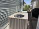 Exterior view of air conditioning unit, providing efficient climate control for comfortable living at 8700 E University Dr # 1450, Mesa, AZ 85207