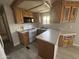 Updated kitchen with modern appliances, laminate floors and ample cabinet space at 8700 E University Dr # 1450, Mesa, AZ 85207