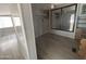 Main bedroom showcasing built in vanity, mirror closet, and updated laminate flooring at 8700 E University Dr # 1450, Mesa, AZ 85207