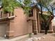 Charming two-story home with a well-maintained lawn and a classic architectural design at 8732 W Adam Ave, Peoria, AZ 85382