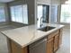 Beautiful kitchen featuring modern island with sink, stainless steel appliances, and plenty of light at 8732 W Adam Ave, Peoria, AZ 85382