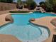 Sparkling pool complete with rock waterfall features, and a relaxing spa for ultimate outdoor enjoyment at 8732 W Adam Ave, Peoria, AZ 85382