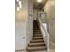 Elegant staircase featuring a modern design and natural light, leading to the upper level at 8732 W Adam Ave, Peoria, AZ 85382