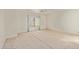 Bright bedroom with large window, neutral colors, and carpeted floor at 9123 W Utopia Rd, Peoria, AZ 85382