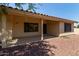 Covered patio offering outdoor space, featuring access to windows, and desert landscaping at 9123 W Utopia Rd, Peoria, AZ 85382