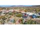 Aerial view of local businesses and a waterfall feature near the property with mountain views at 1 Easy St # 15, Carefree, AZ 85377