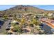 Aerial view shows local businesses, tents, parking, and desert landscaping near property at 1 Easy St # 15, Carefree, AZ 85377
