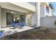 Cozy backyard patio with a dining set, low-maintenance landscaping, and access to the home's living area at 1 Easy St # 15, Carefree, AZ 85377