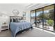 Serene bedroom with a comfortable bed, balcony access, and scenic views for a tranquil retreat at 1 Easy St # 15, Carefree, AZ 85377