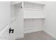 A well-organized walk-in closet with ample shelving and rod space for clothing storage at 1 Easy St # 15, Carefree, AZ 85377