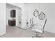 Modern home office featuring a glass desk, white chair, and stylish decor for a contemporary workspace at 1 Easy St # 15, Carefree, AZ 85377