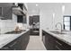 Kitchen with stainless steel appliances, sleek cabinets, and granite countertops at 1 Easy St # 15, Carefree, AZ 85377