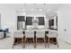 Kitchen island with seating, granite countertops, and modern pendant lighting at 1 Easy St # 15, Carefree, AZ 85377