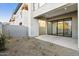 A low-maintenance backyard with sliding glass doors and stone pillar accents at 1 Easy St # 4, Carefree, AZ 85377