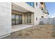 An inviting backyard patio and small yard feature sliding glass doors and exterior access at 1 Easy St # 4, Carefree, AZ 85377
