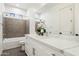 Bathroom boasts a white vanity, marble countertop, soaking tub, and walk-in shower at 1 Easy St # 4, Carefree, AZ 85377