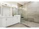 Luxurious bathroom with double vanity, walk-in glass shower, and modern finishes at 1 Easy St # 4, Carefree, AZ 85377